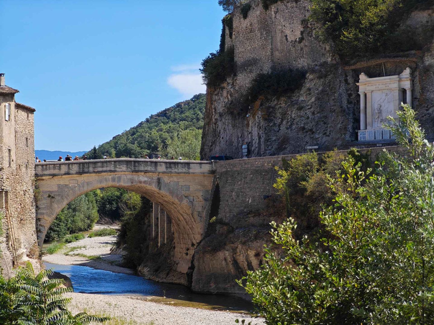 Ancient Roman bridge in Vaison la Romaine; historic site near Provence market days.